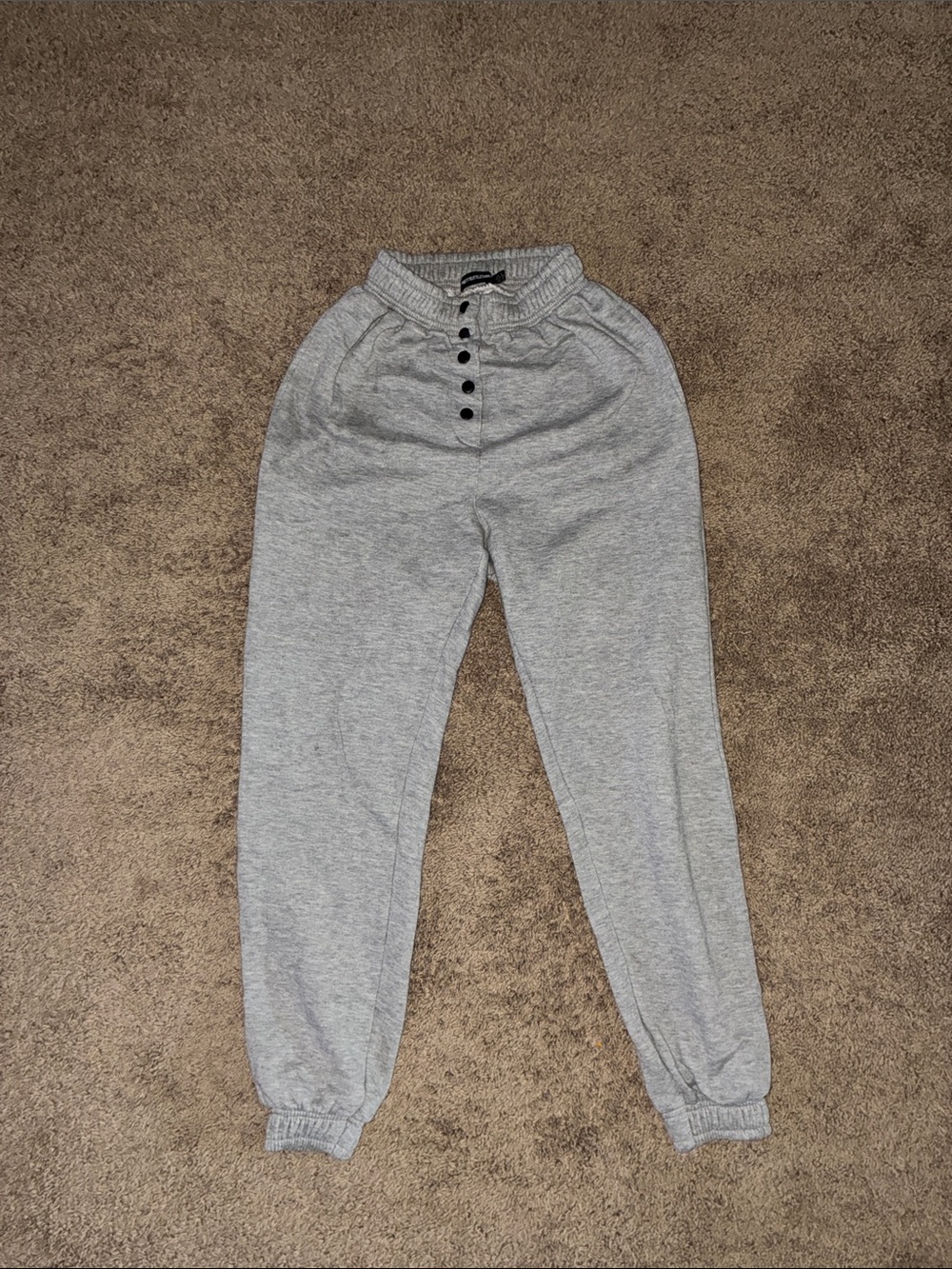 PrettyLittleThing Light Gray Henley Joggers with Black Buttons